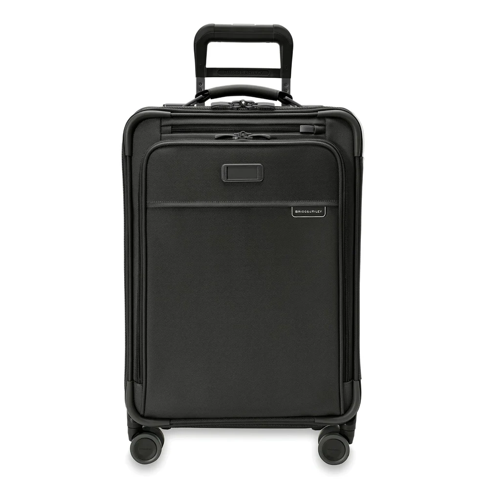 Briggs & Riley Baseline Essential 22-inch Carry-On Expandable Spinner Review: Packing control for frequent travelers who accept the weight